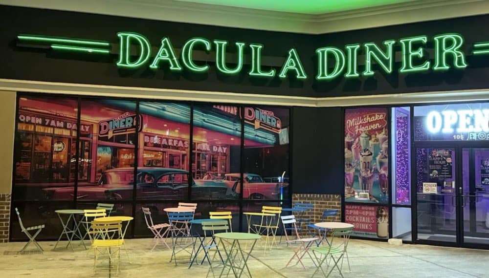 Dacula Diner exterior with outdoor seating, vibrant signage, and welcoming atmosphere in Atlanta res.