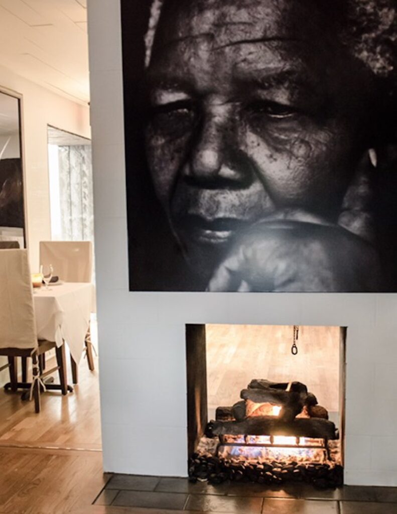 Nelson mandela's fireplace in the dining room.