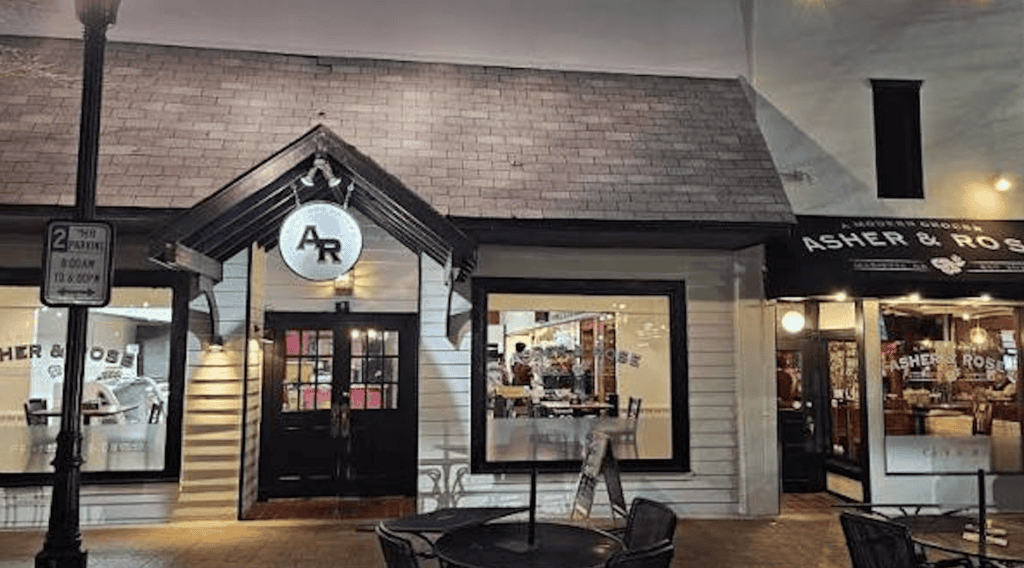 A restaurant storefront with "AR" logo, located in Atlanta, featuring inviting exterior design and w.